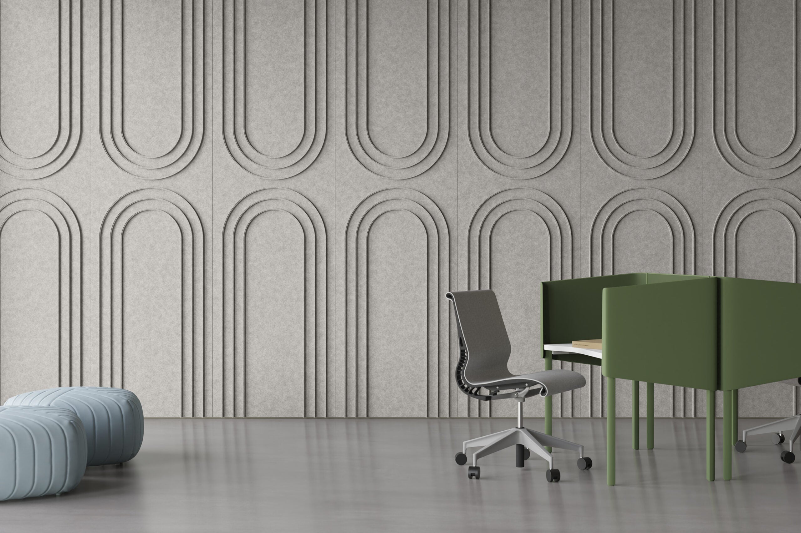 Office space with gray felt walls with large arch shapes
