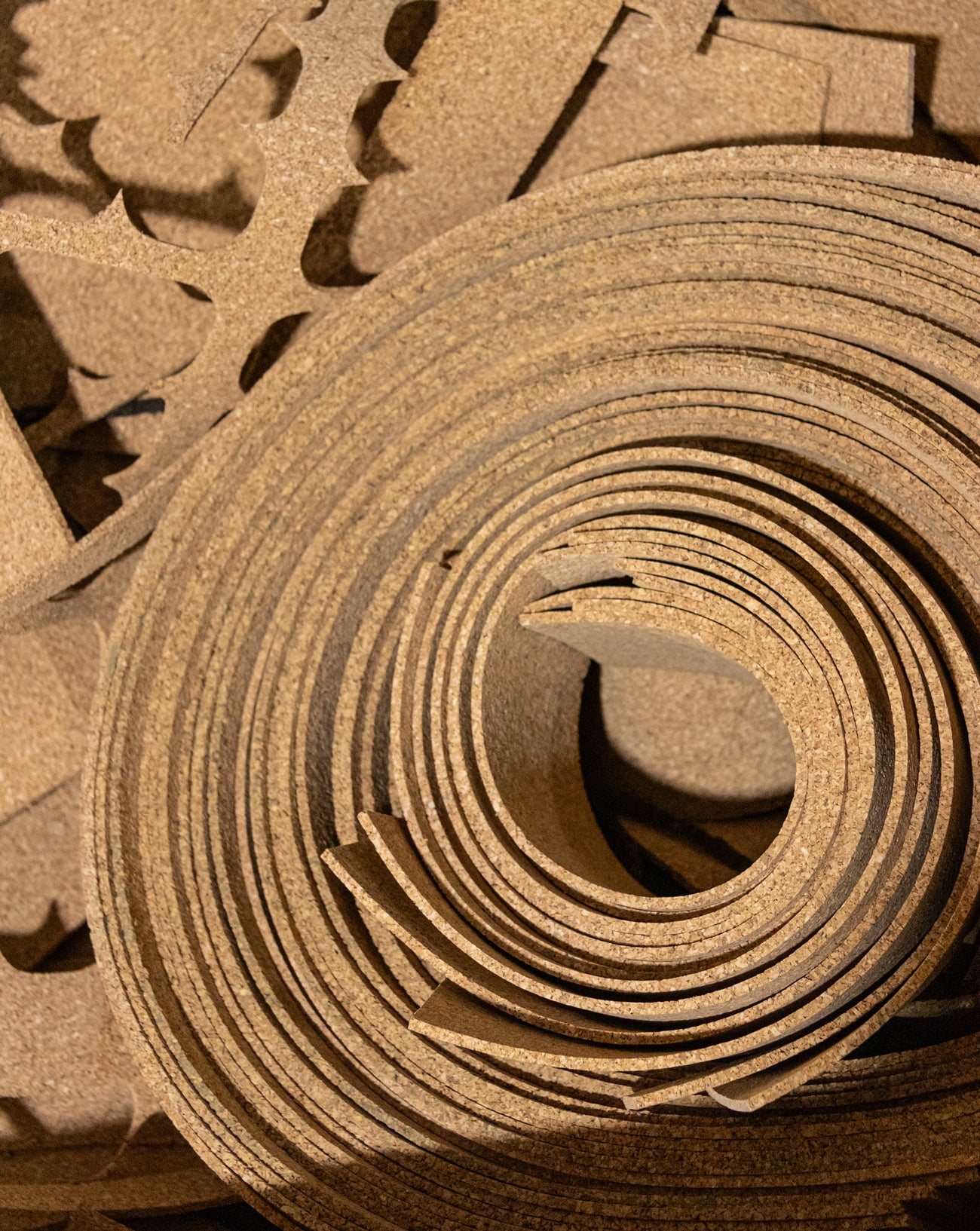 Rolls and chucks of flat cork material