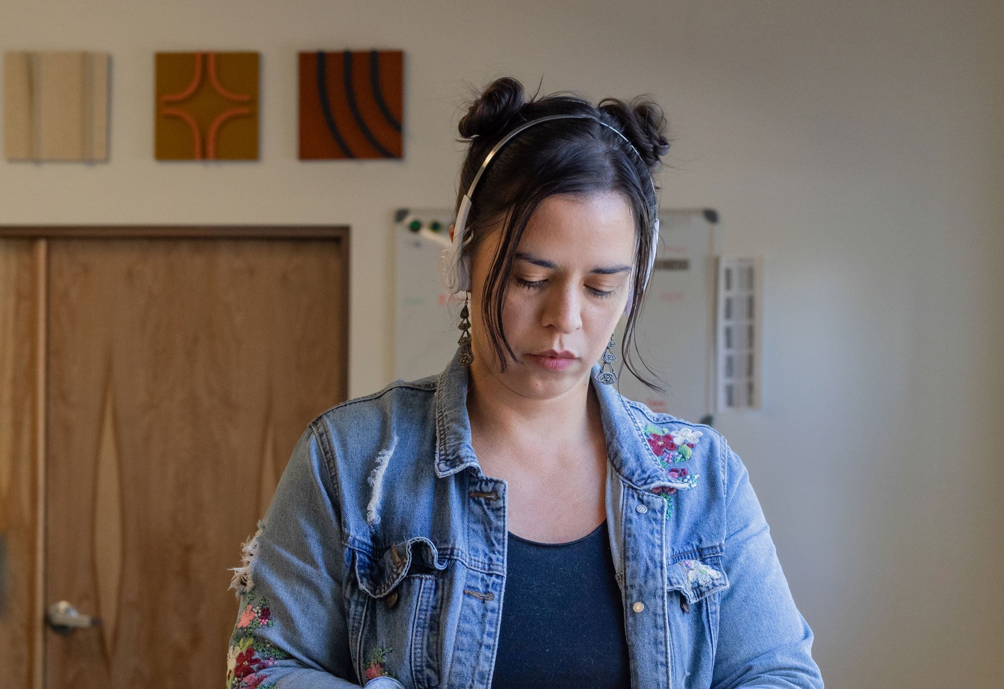 felt wall art in two ton reds, blues, and greens