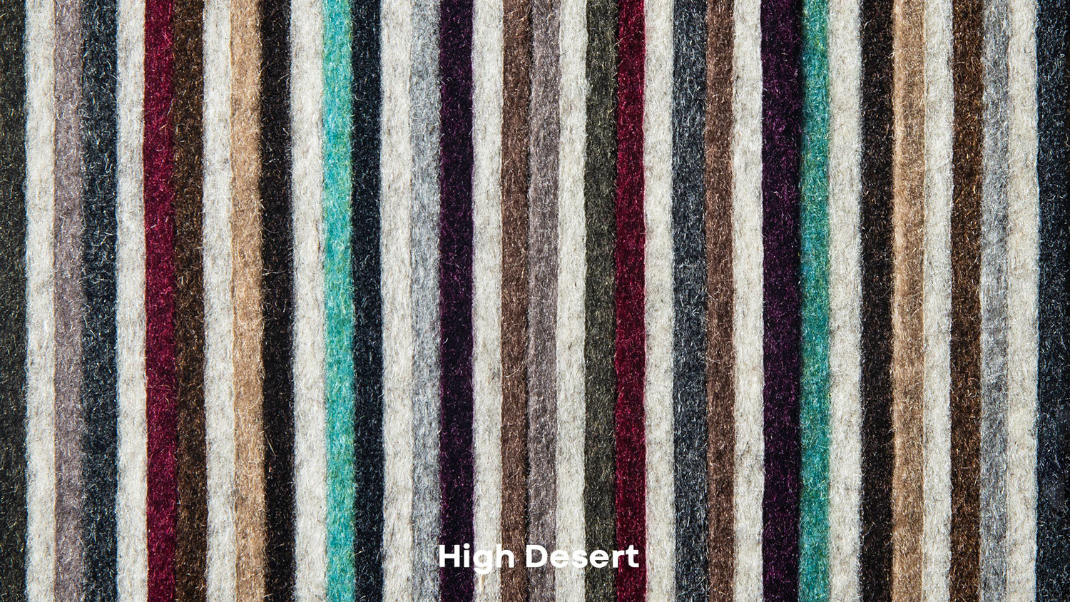Textured fabric swatch with vertical stripes in a range of colors labeled 'High Desert'.