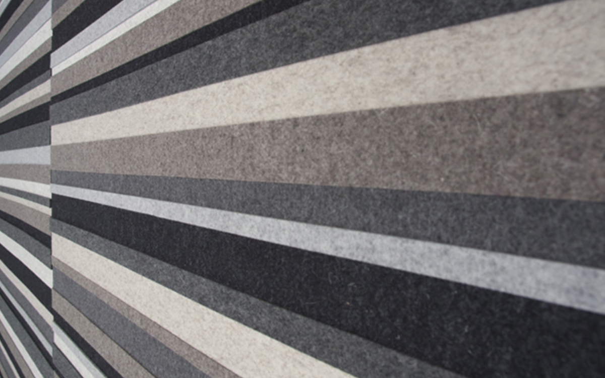 Wide horizontal strips of felt in various shades of gray.