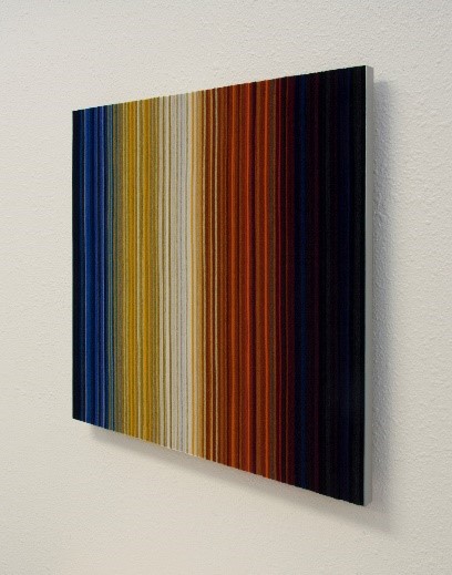 Square wall panel with vertical strips of color in blue, yellows and oranges