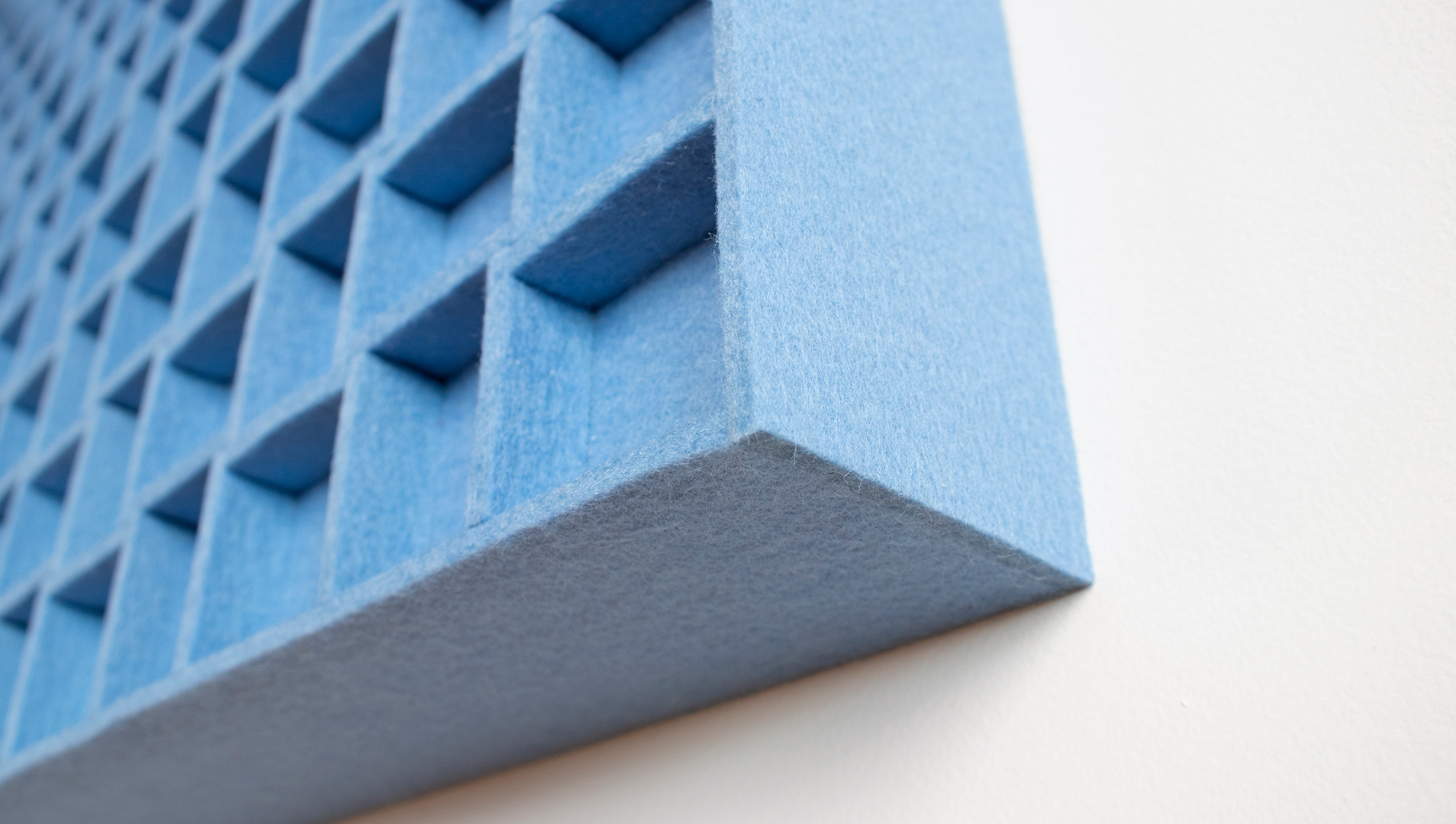 detail of a submaterial odessa panel in sky blue handmade of wool felt