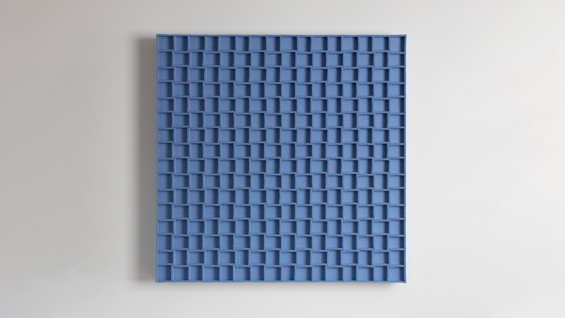 Sky blue square wood felt wall panel with a grid pattern