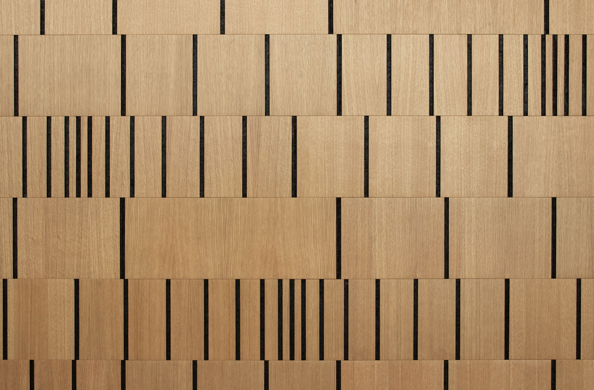 Wood wall covering in white oak and smoked cork with varying concentrations of vertical lines at random intervals