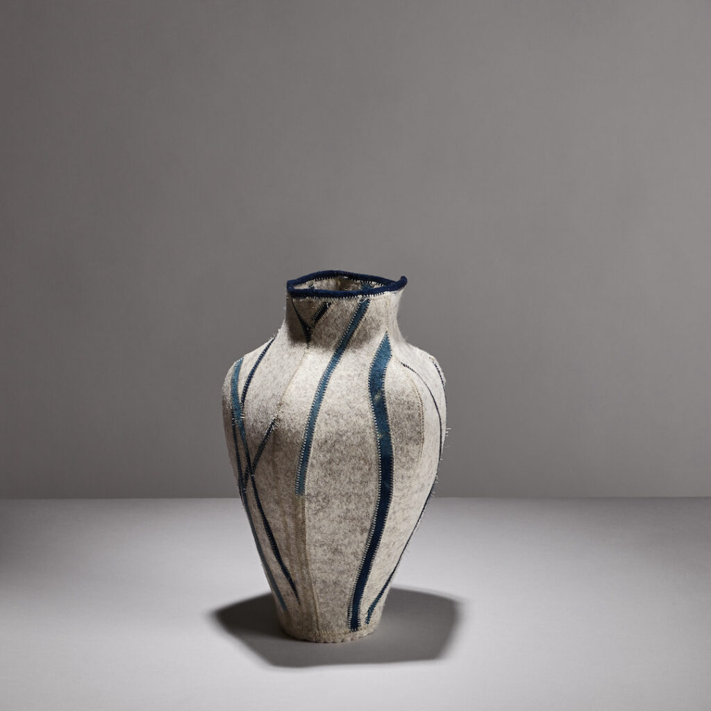large vessel made by Molly Zimmer out of grray wool with hand dyed indigo stripes